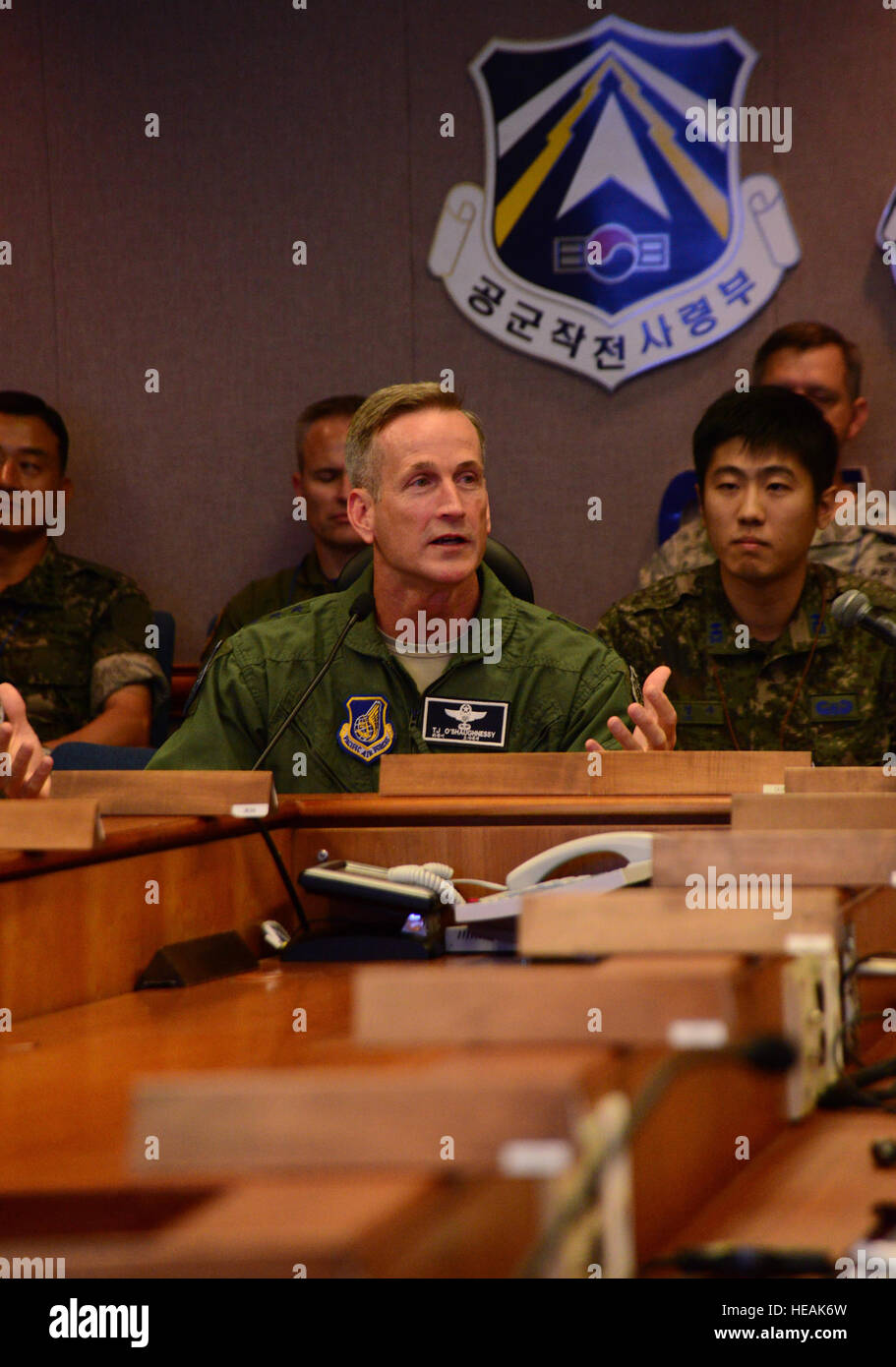 Lt. Gen. Terrence O’Shaughnessy speaks to senior leaders from the U.S. and Republic of Korea Air Forces during the Air Boss Conference on Osan Air Base, RoK, July 17, 2015. The annual conference, hosted by the Air Component Command commander, is a bi-lateral forum between U.S. and RoK forces under the combined forces aegis on the peninsula. The conference plays a vital role in bringing together commanders from both on and off the peninsula. Each of the commanders could send forces to support a potential crisis or conflict in the RoK. O’Shaughnessy is the deputy commander, United Nations Comman Stock Photo