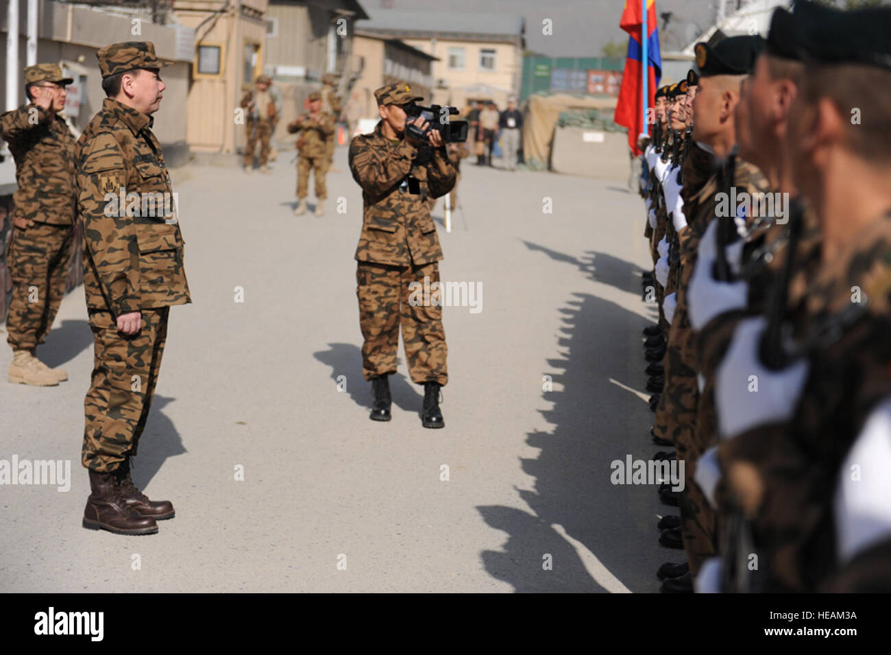 100405-F-5561D-002 Mongolian soldiers stand if formation for the Mongolian Minister for Defense Luvsanvandan Bold April 5. The Minister of Defense visited the soldiers at many differant facilities in Kabul.Senior Airman Matt Davis) Stock Photo