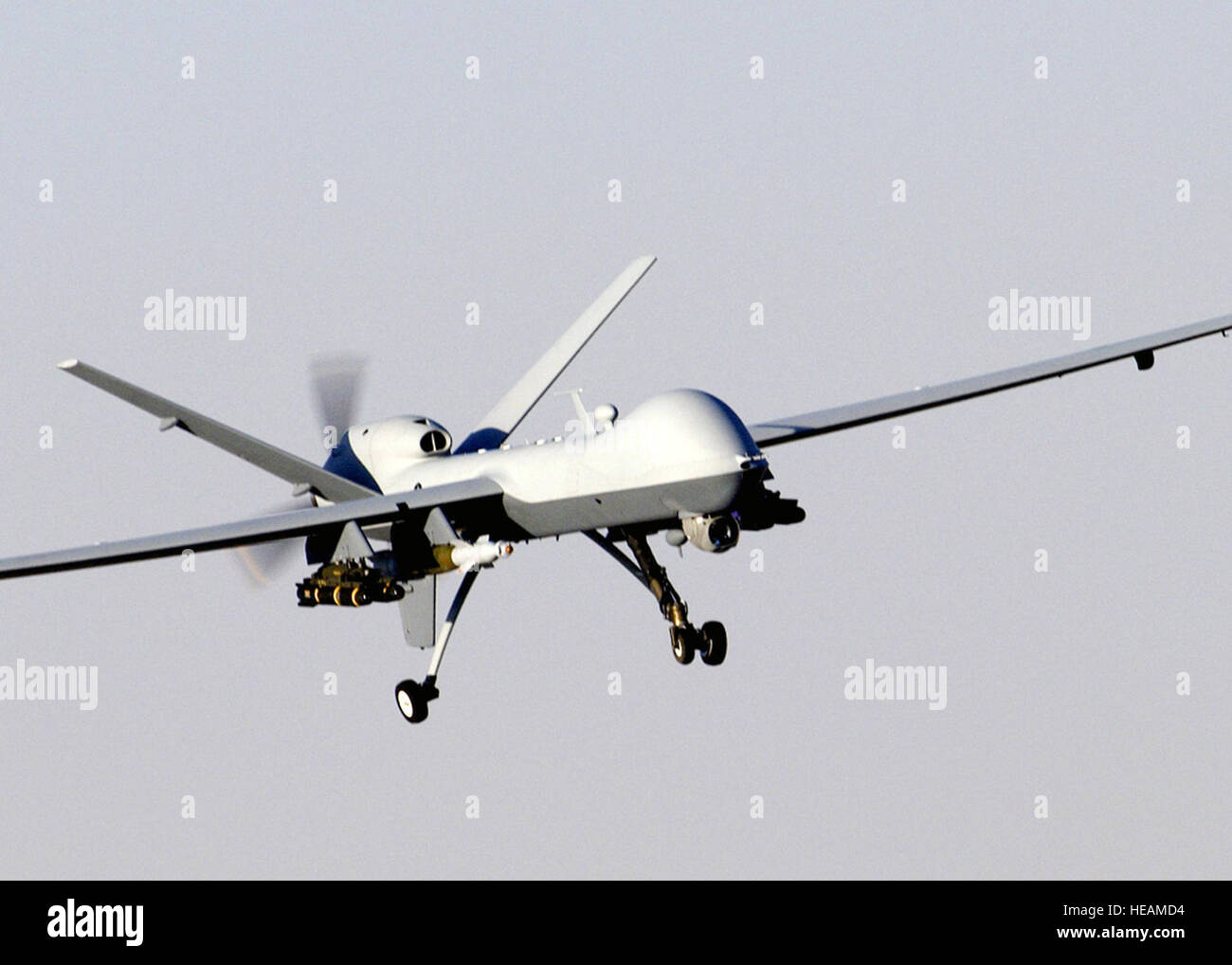 A Mq 9 Reaper Unmanned Aerial Vehicle Prepares To Land After A Mission