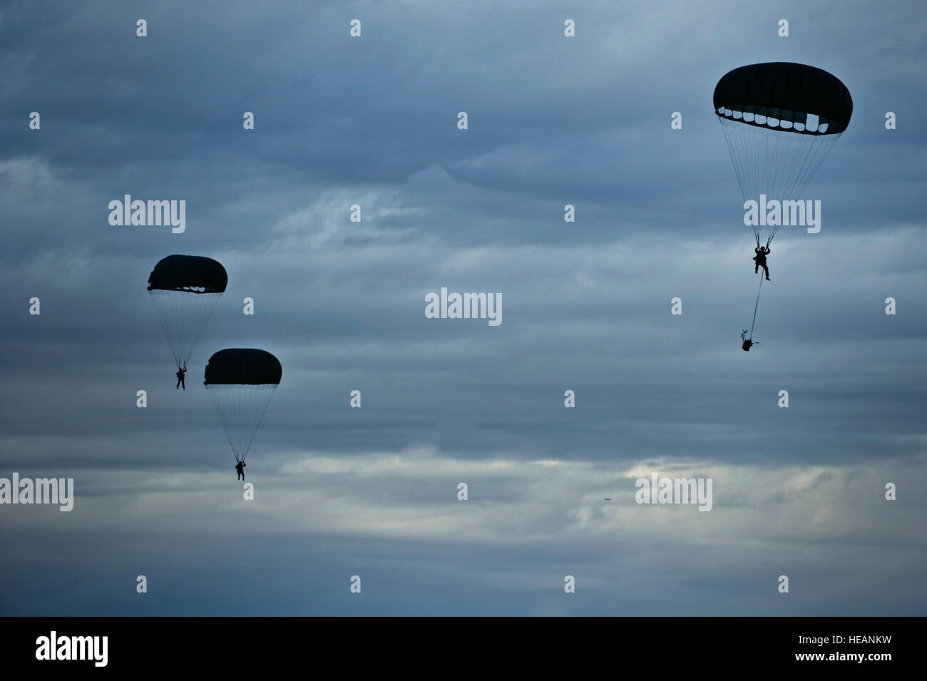 U.S. Air Force Airmen, 820th RED HORSE airborne flight, parachute into