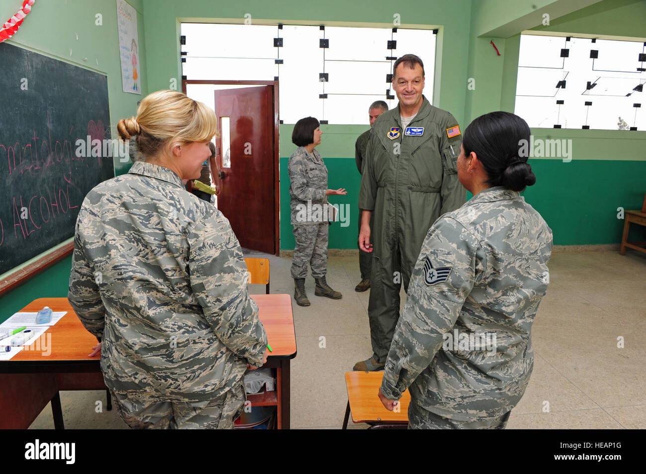 U.S. Air Force Brig. Gen. Kory Cornum, center right, the commander of the 81st Medical Group (MDG) at Keesler Air Force Base, Miss., greets 81st MDG Airmen taking part in a medical readiness training exercise July 25, 2012, in San Miguel, Peru, as part of New Horizons 2012. New Horizons is a U.S. Southern Command-sponsored annual series of joint humanitarian assistance exercises deploying U.S. military engineers, veterinarians, medics and other professions to Central and South American nations for training, construction projects and to provide humanitarian and medical services.  Staff Sgt. Mic Stock Photo