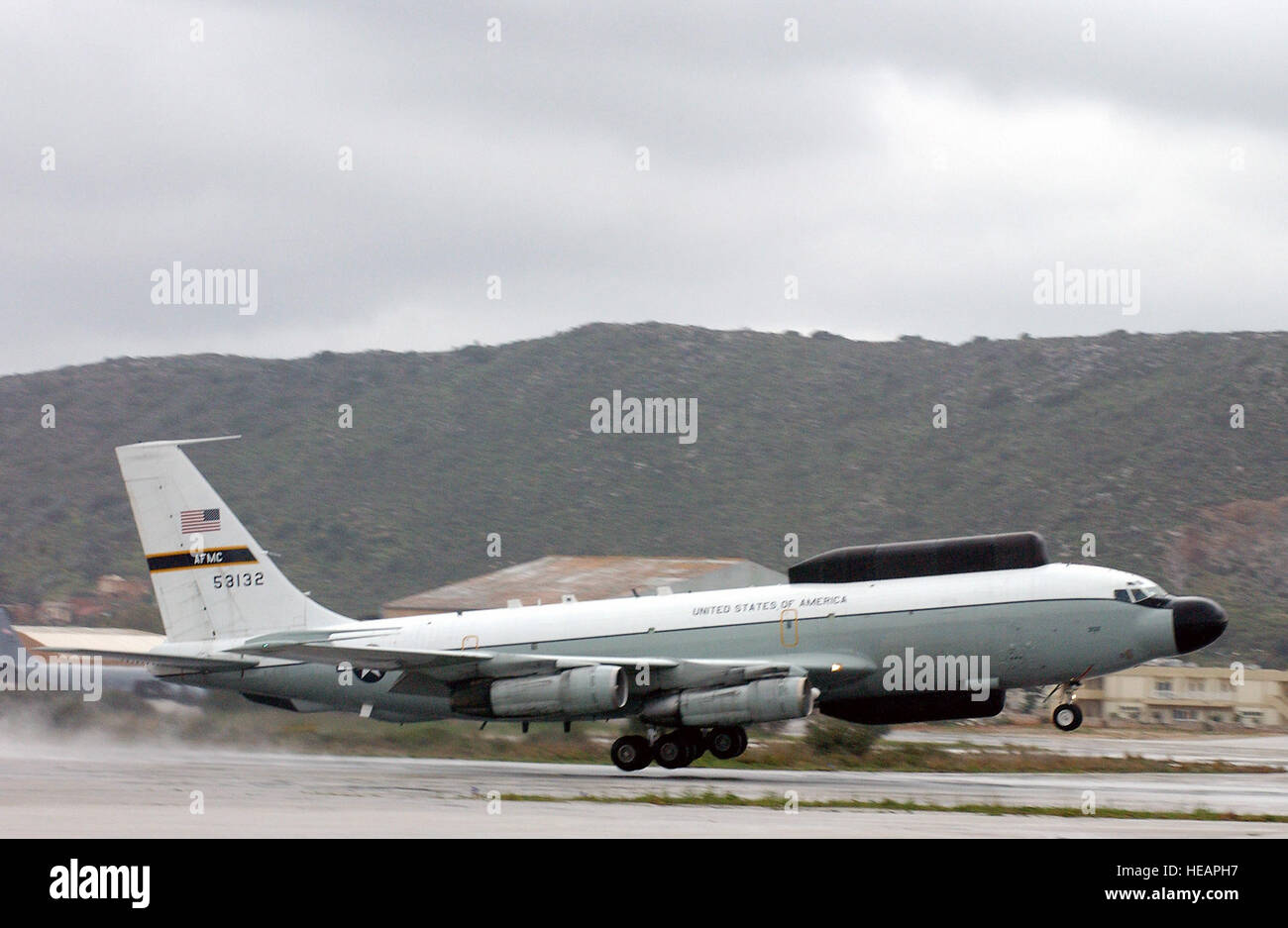 An NKC-135 'Big Crow' ECM aircraft takes off from a forward base while ...