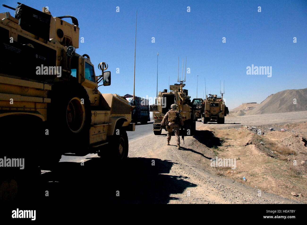 A quick stop by the ANCOP convoy headed south to the Helmend Province. Over 45 tactical vehicles rolled out with over 300 Afghan National Civil Order Police soldiers. Stock Photo