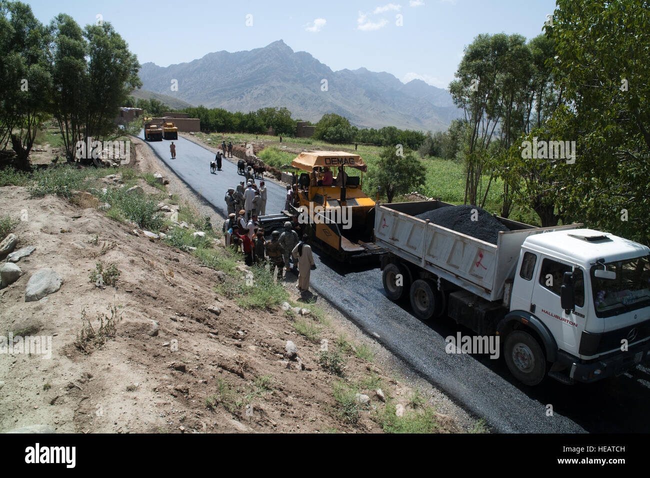 (Kapisa Province, Afghanistan) Road construction crews build a road ...