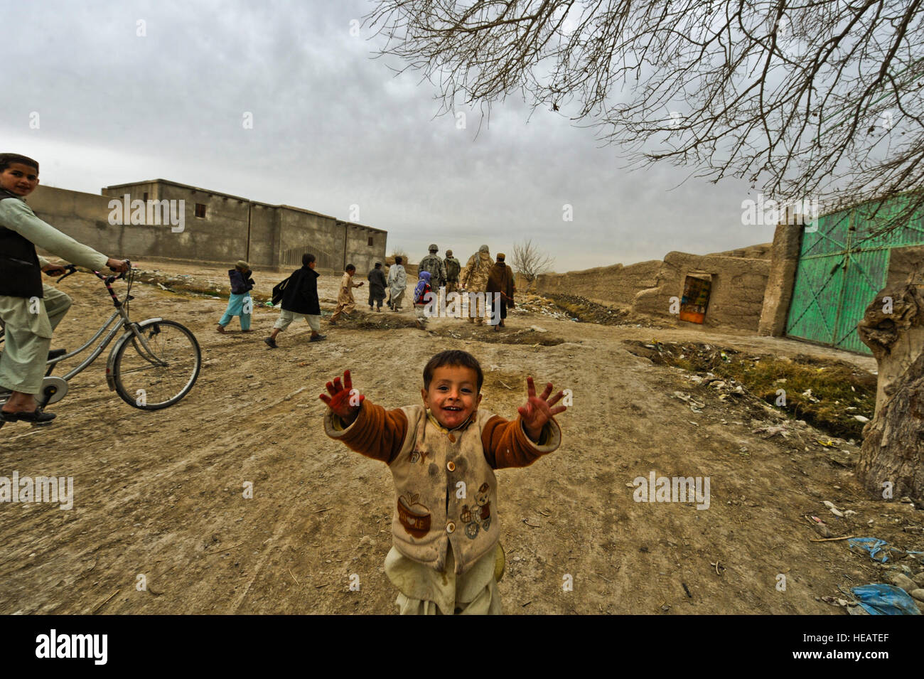An Afghan boy greets soldiers from B Flight 27 Squadron Royal
