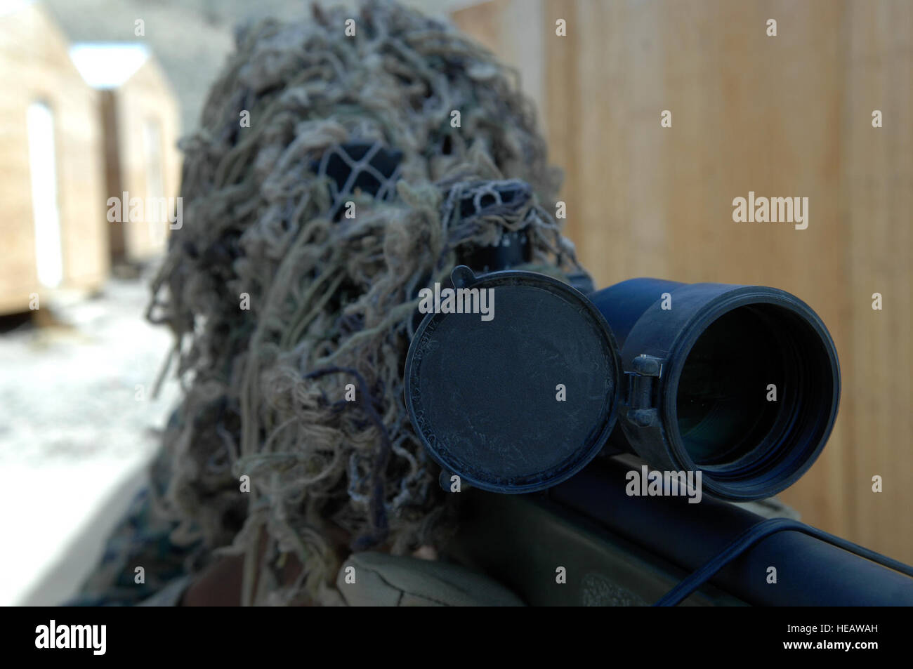A participant in Javelin Thrust 2010 looks through a scope at Hawthorne