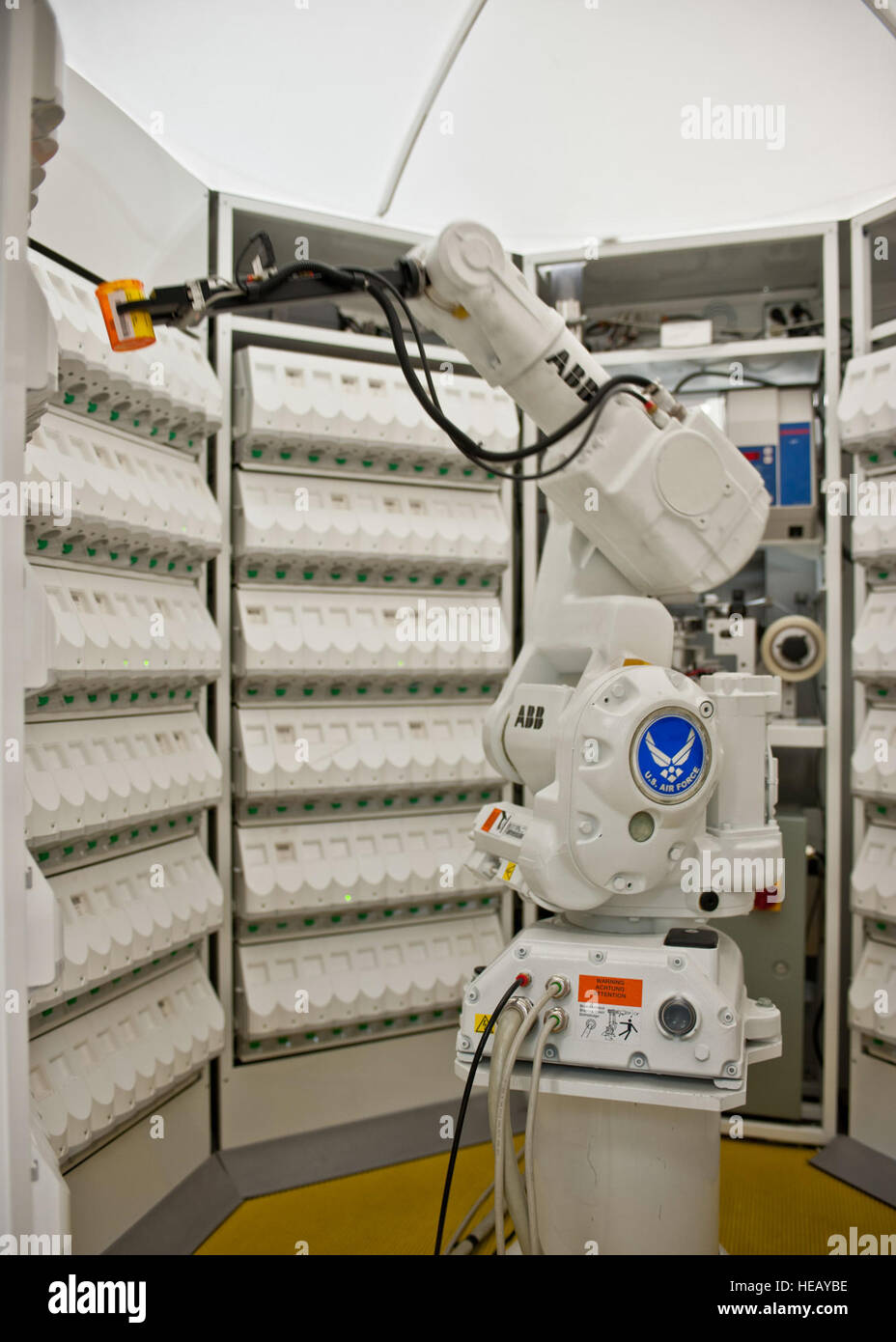 “Robby,” a robotic dispensing system, moves his arm to dispense pills