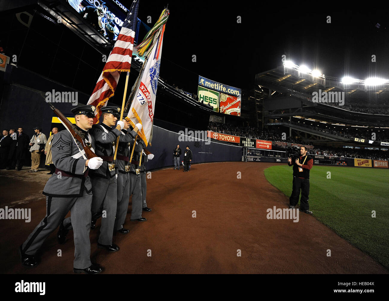 U.S. Military Academy Cadets post the colors on the field before Game 1