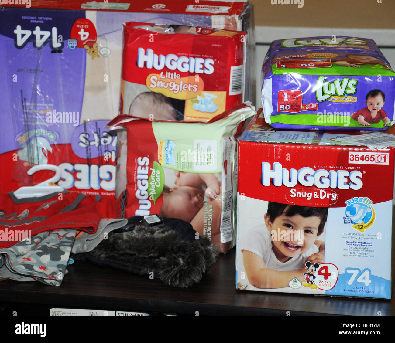 Diapers and clothing sit on display during a diaper drive March 14