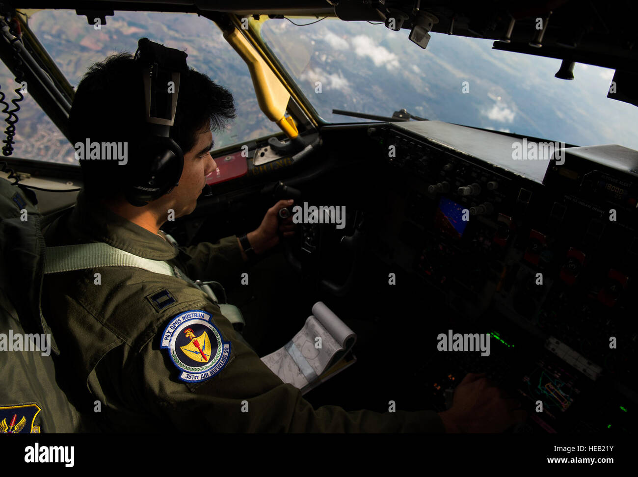 Capt. Paul Anguita, 100th Air Refueling Wing pilot, flies a KC-135 Stratotanker above Ramstein Air Base, Germany, March 26, 2015. Aircrew and a KC-135 from Royal Air Force Mildenhall, England, spent multiple days at Ramstein performing refueling missions for A-10 Thunderbolt IIs. Pilots also took part in aircraft commander upgrade training, helping them progress to the next level of their career. Senior Airman Damon Kasberg) Stock Photo