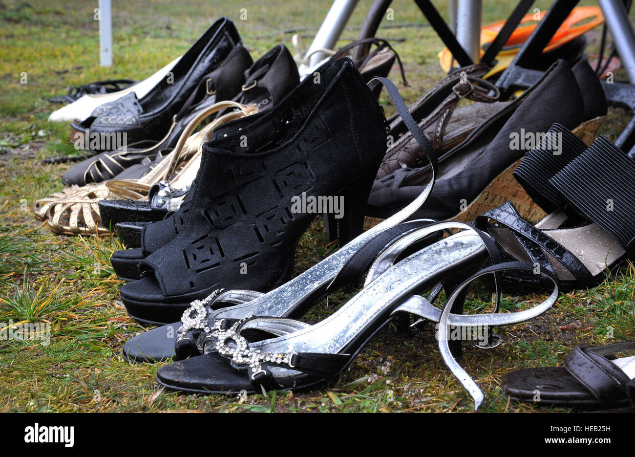 Heels sit on display during the first One Mile Walk in Her Heels and 5K Run March 25, 2016, at Ramstein Air Base, Germany. The event wrapped up Women’s History Month by empowering others to understand the struggles women past and present have endured by using high-heeled shoes as a symbol of femininity. Airman 1st Class Larissa Greatwood) Stock Photo
