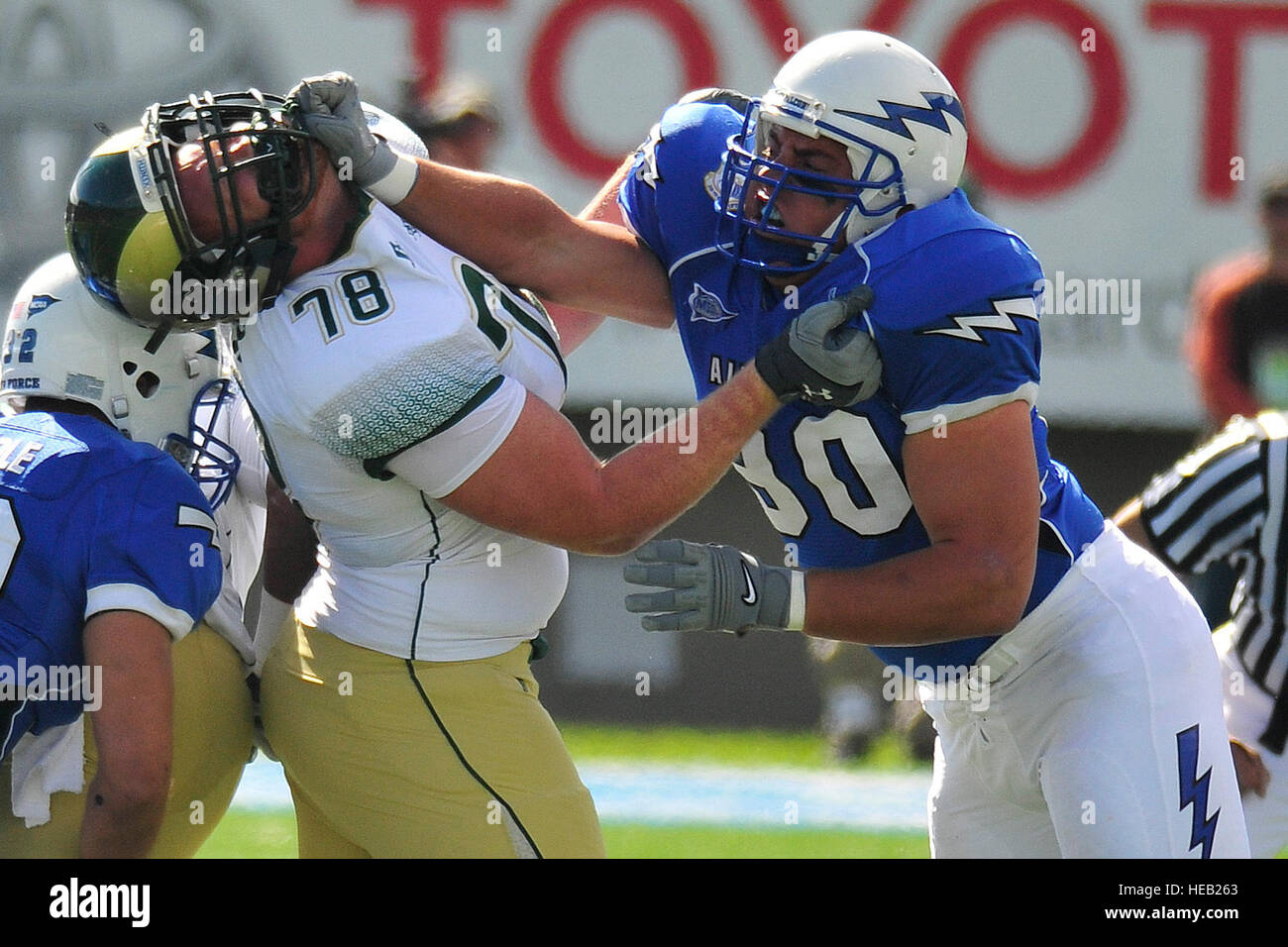 Air Force defensive lineman Rick Ricketts battles Colorado State offensive lineman Weston Richburg during the teams' Mountain West Conference contest at Falcon Stadium Oct 9, 2010. Ricketts is a senior and native of San Jose, Calif. (Air Force photo/Bill Evans) Stock Photo