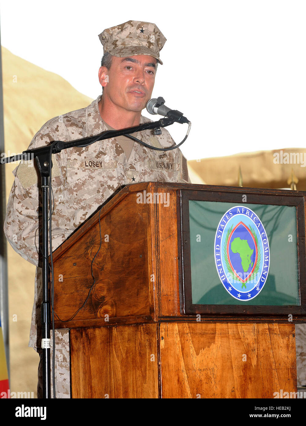 The U.S. Navy conducts a change of command ceremony at Camp Lemonnier ...
