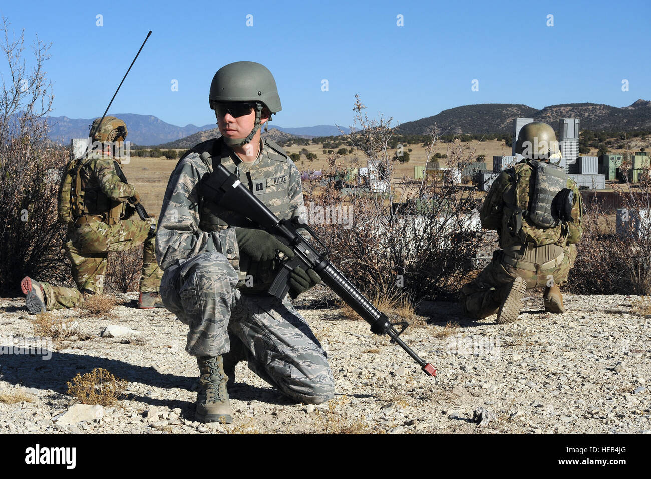 SCHRIEVER AIR FORCE BASE, Colo. -- Captain Zachary Ritter, 3rd Space Operations Squadron, secures his perimeter during a joint exercise with the 13th Air Support Operations Squadron and 4th Infantry Division at a Fort Carson Colorado training range Wednesday, 9 November 2016.  The purpose of the exercise was for all participants to gain a better understanding of the products utilized that the 50th Space Wing provides.  Dennis Rogers) Stock Photo