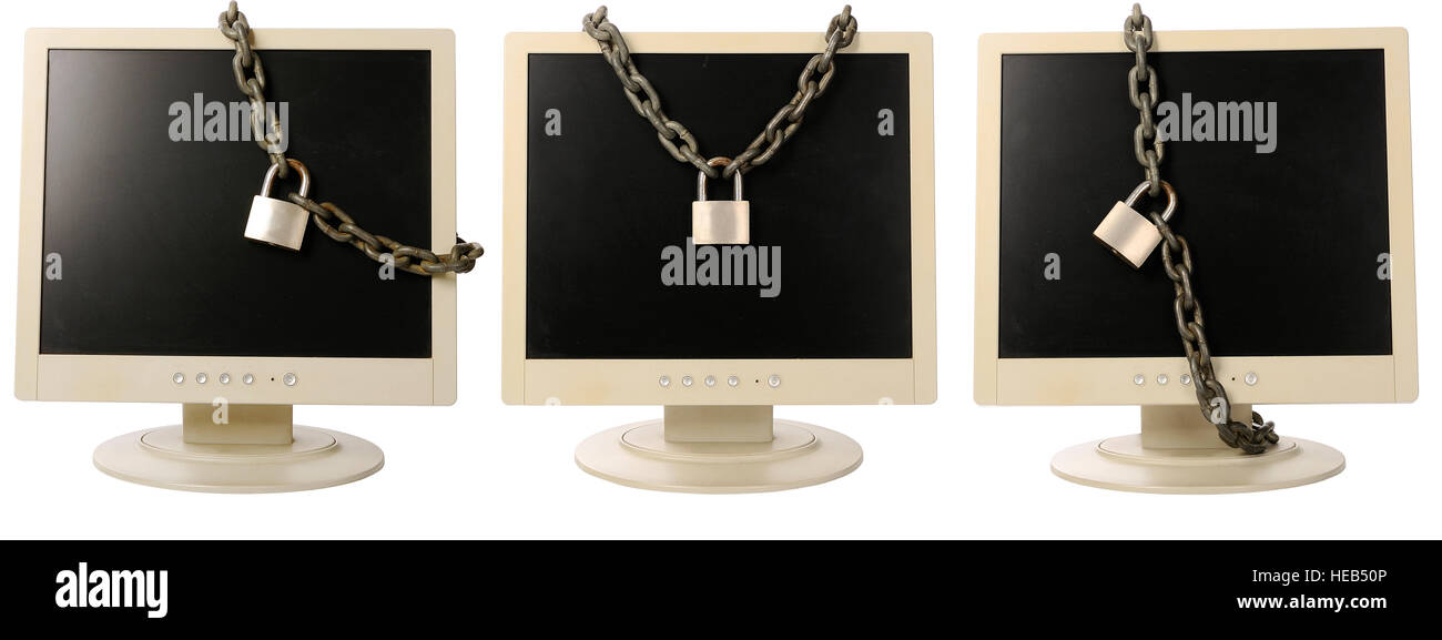 Set of computer monitor tied with chain. A computer security concept Stock Photo