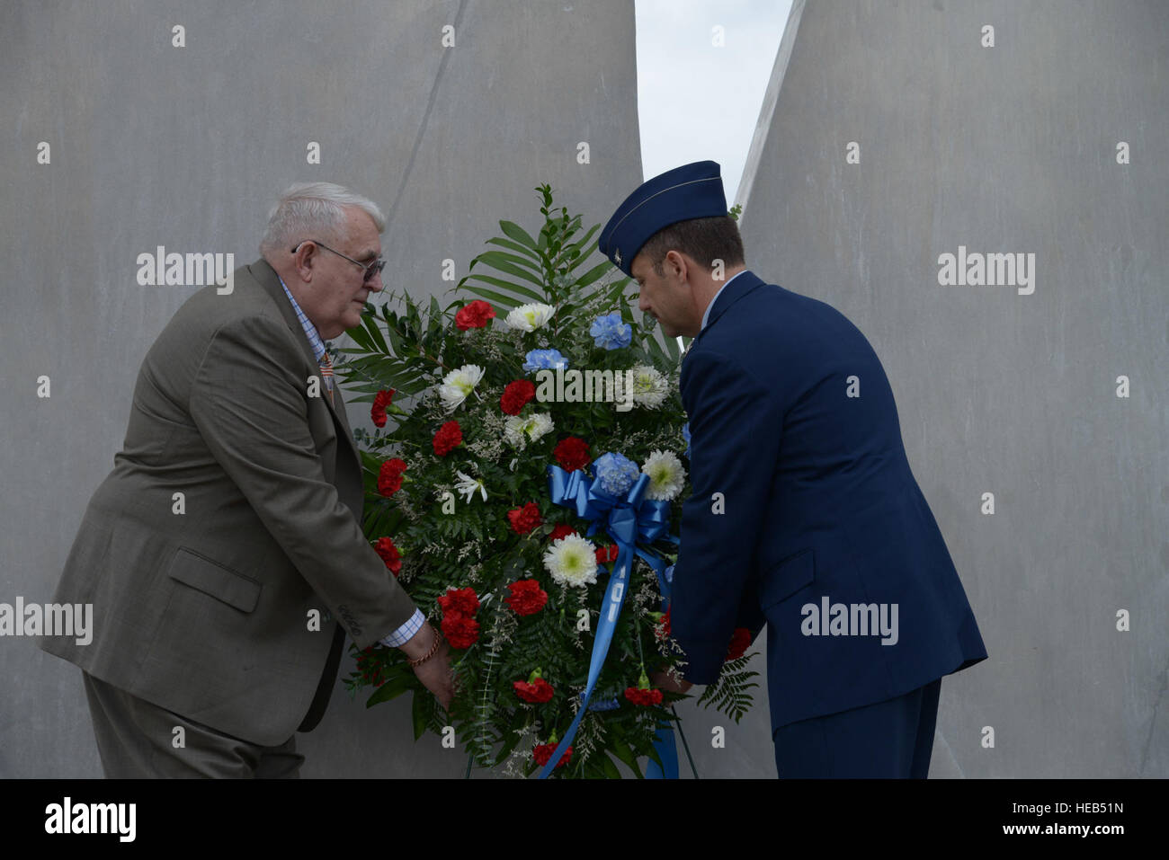 Retired Air Force Col. Wayne Erwin, Red River Valley Association; and Air Force Col. Gerald V. Goodfellow, 12th Flying Training Wing commander, place the wreath at the Joint Base San Antonio-Randolph Missing Man Monument during a wreath laying ceremony to honor prisoners of war and those missing in action March 28. For the past 41 years, the 560th Flying Training Squadron has hosted the Freedom Flyer Reunion for members of the 4th Allied POW Wing. In addition to the wreath laying ceremony, each year a symposium that includes speakers representing POWs and spouses of POWs is also held at JBSA-R Stock Photo