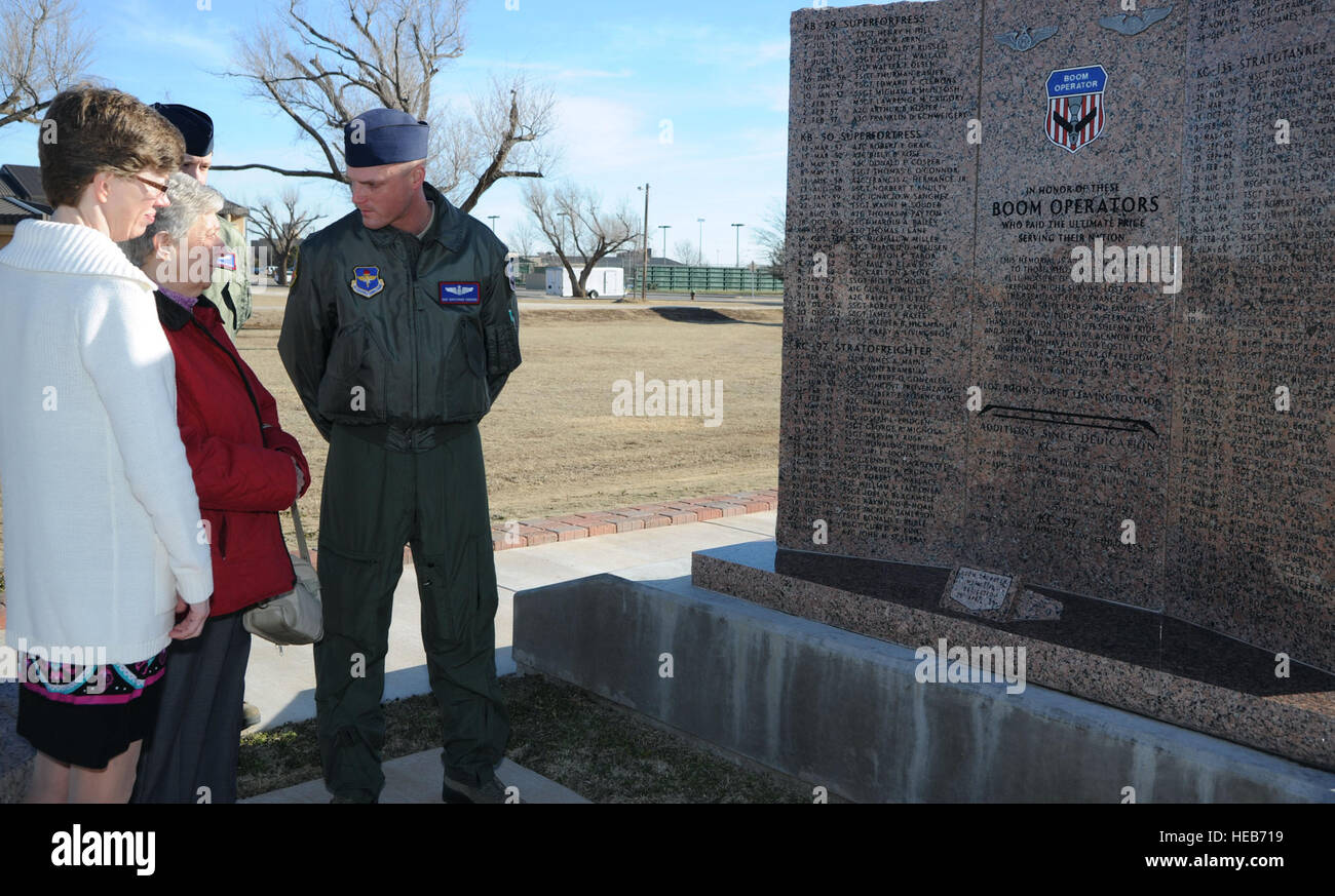 Staff Sgt. Christopher Pedersen, 54th Air Refueling Squadron boom operator instructor, speaks to Luella Klaverkamp and Lisa Pollreis about the Boom Memorial at Wings of Freedom Park, March 3, 2013. Klaverkamp and Pollreis are the mother and sister of late KC-135 Stratotanker boom operator, Airman 1st Class Bruce Klaverkamp, who died in a plane crash, March 13, 1972, during a routine training mission at Carswell AFB, Texas. The family made an 18-hour drive from Clear Water, Minn., to Altus AFB to visit the Boom Memorial where Bruce's name is etched in stone, a testament to his service.  Airman  Stock Photo