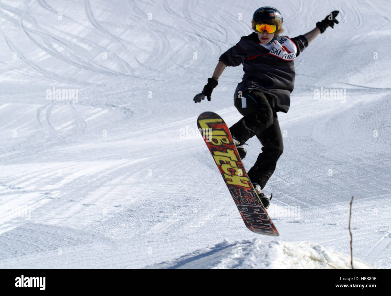 Connor Duffy, 15, performs a method air snowboarding trick during the
