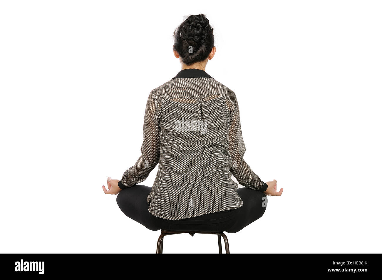 Woman doing yoga isolated over white background Stock Photo - Alamy