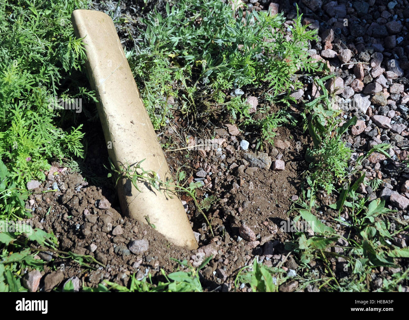 A decoy improvised explosive device lays in the dirt during a Prime