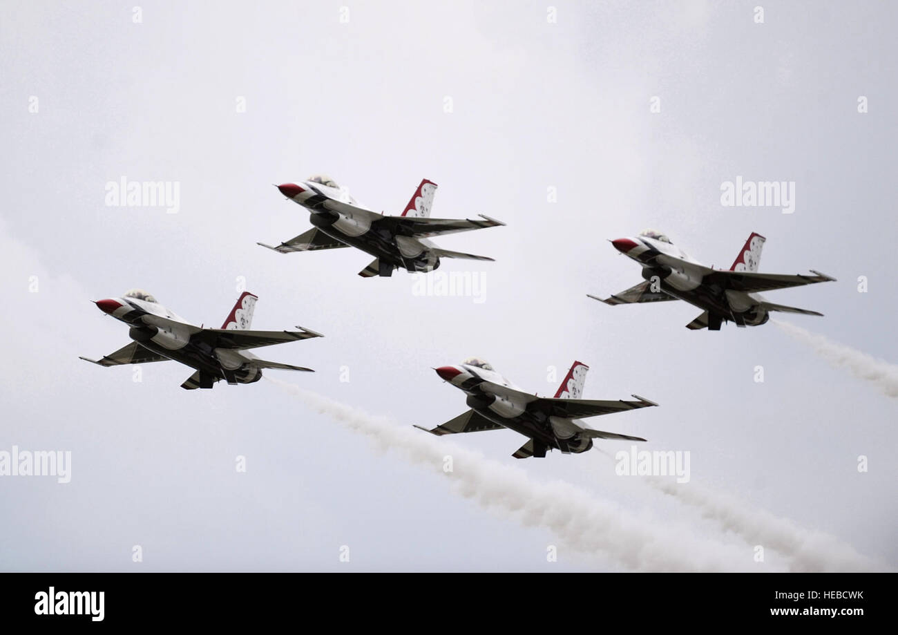 The U.S. Air Force 'Thunderbirds', perform the Diamond Pass and Review during Rockford AirFest, at Chicago Rockford International Airport, June 7, 2014. (U.S. Air Force photo/Master Sgt. Stan Parker) Stock Photo