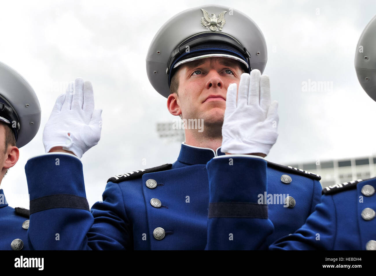 Stephen Beaton, a member of the U.S. Air Force Academy Class of 2015, takes the Oath of Office given by Brig. Gen Stephen C. Williams, commandant of cadets, during graduation exercises in Falcon Stadium in Colorado Springs, Colo., May 28, 2015. Over 800 cadets graduated and became second lieutenants. Deborah Lee James, the Secretary of the Air Force, gave the graduation address. (Air Force photo by Liz Copan) (released) Stock Photo