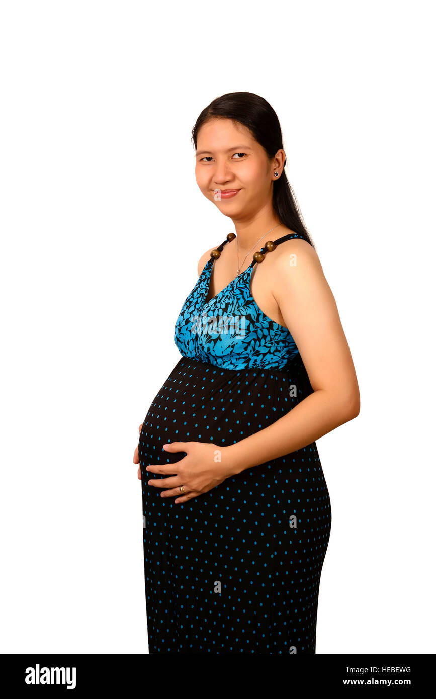 Portrait of a happy pregnant woman in 9 months isolated over white Stock Photo