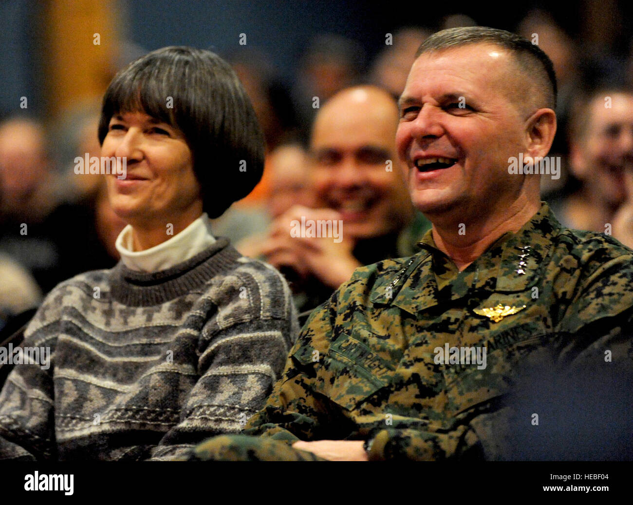 Vice Chairman of the Joint Chiefs of Staff U.S. Marine Gen. James E. Cartwright and his wife, Sandee, laugh during a USO performance at Eielson Air Force Base, Alaska, Nov. 10, 2008. Cartwright is on an eight-day, five-country visit to see troops. DoD photo by Air Force Master Sgt. Adam M. Stump. (Released) Stock Photo