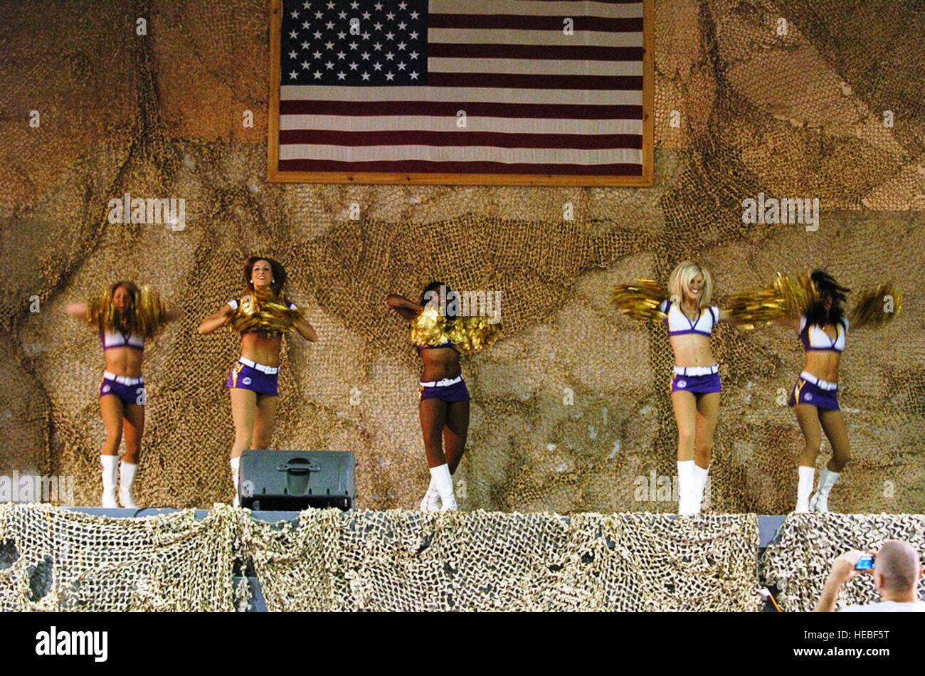 Minnesota Viking cheerleaders Jessie, Sarah, Amanda, Peyton and Bailey perform a dance routine during the Viking cheerleaders’ tour at Bagram Airfield, Afghanistan, May 19. The ladies visited BAF with a promise to give their all and to help pump up the spirits of deployed servicemembers. (U.S. Army photo/Tech. Sgt. Kevin Wallace) Stock Photo