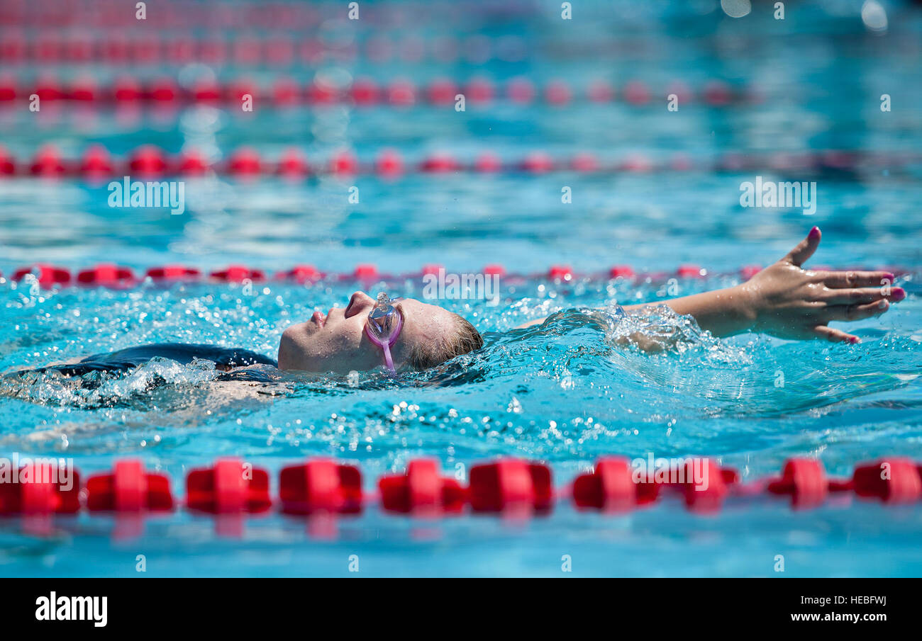 Heather Carter, a Warrior Care attendee, practices her backstroke during a morning swim session
