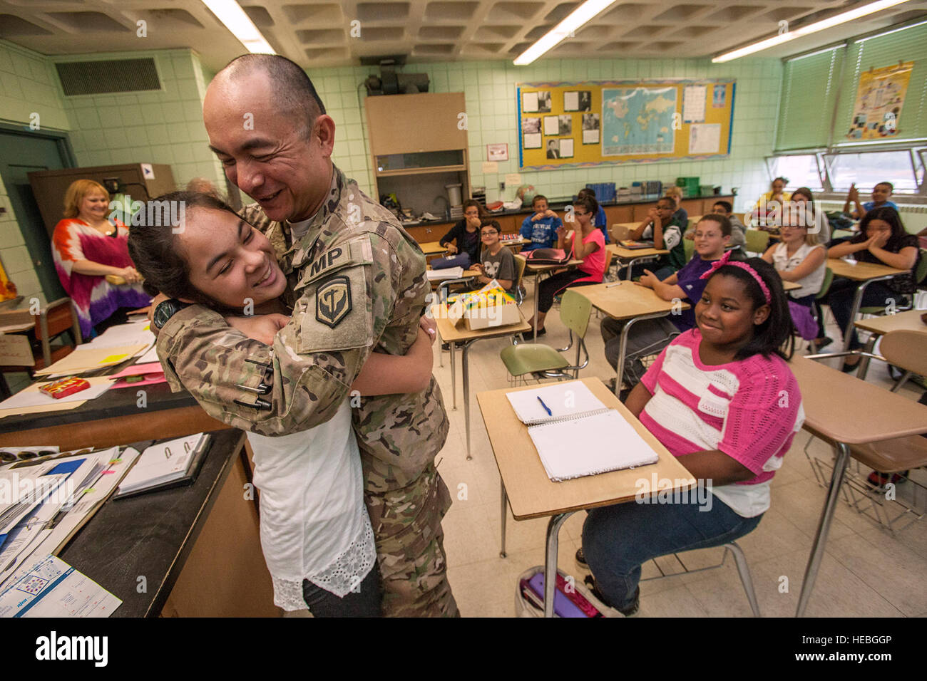 Recently returned 1st Sgt. Joseph P.C. Prieto surprised his daughter