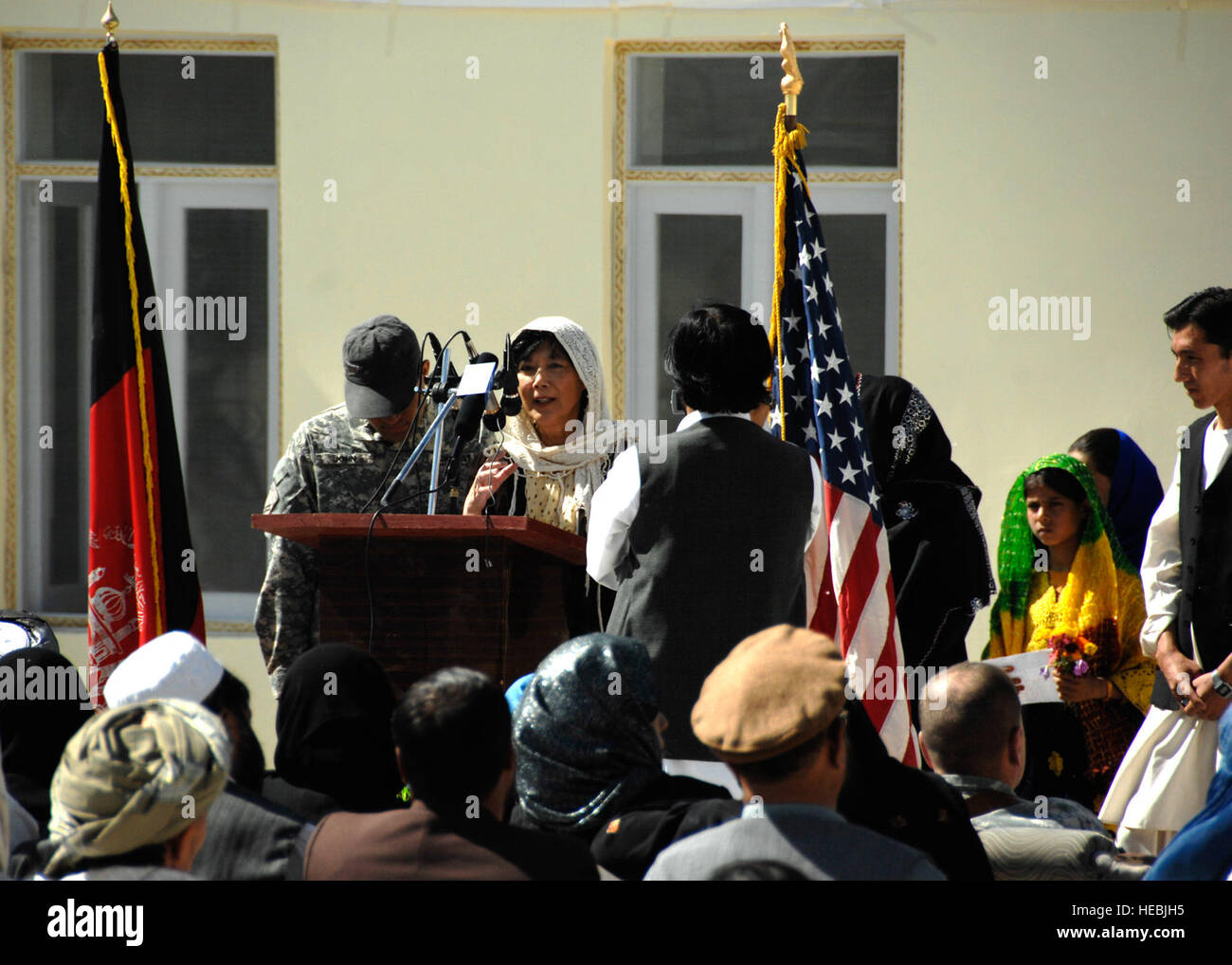 Ching Eikenberry speaks of the importance the all girl school represents to the people in the Zabul Province and the progression this will bring to the women during the opening ceremony, Oct. 19, 2009. Currently, less than one percent of the female population in Afghanistan is literate and the opening of an all female school shows a great deal of progression for the Pashtun people. Mrs. Eikenberry is the wife of Afghanistan Abmassador Karl Eikenberry. (U.S. Air Force photo/Senior Airman Timothy Taylor) Stock Photo