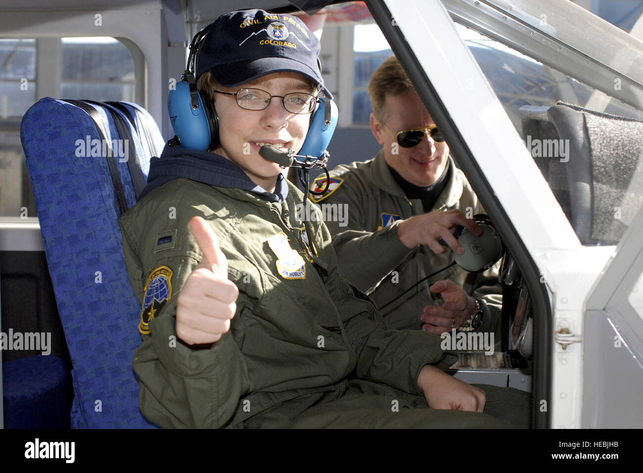 Zachery Olson gets acquainted with a Civil Air Patrol aircraft Jan. 19 at Peterson Air Force Base, Colo. Zachery is a a 14-year-old suffering from neurofibromatosis who has dreamed of becoming a pilot. While on base, Zachery got a flight in the CAP aircraft, toured a C-21 and was made an honorary pilot through the 311th Airlift Squadron and the Make-A-Wish Foundation. (U.S. Air Force photo/Larry Hulst) Stock Photo