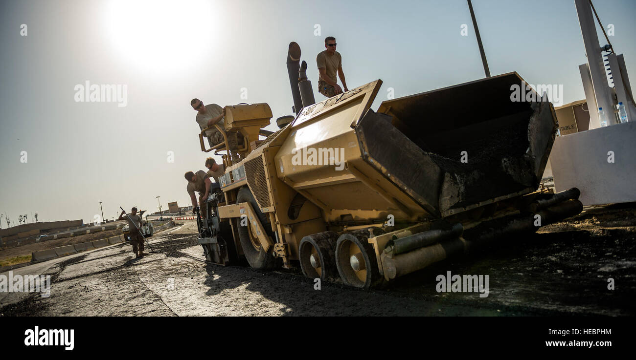 Airmen from the 557th Expeditionary RED HORSE Squadron repave roads in ...