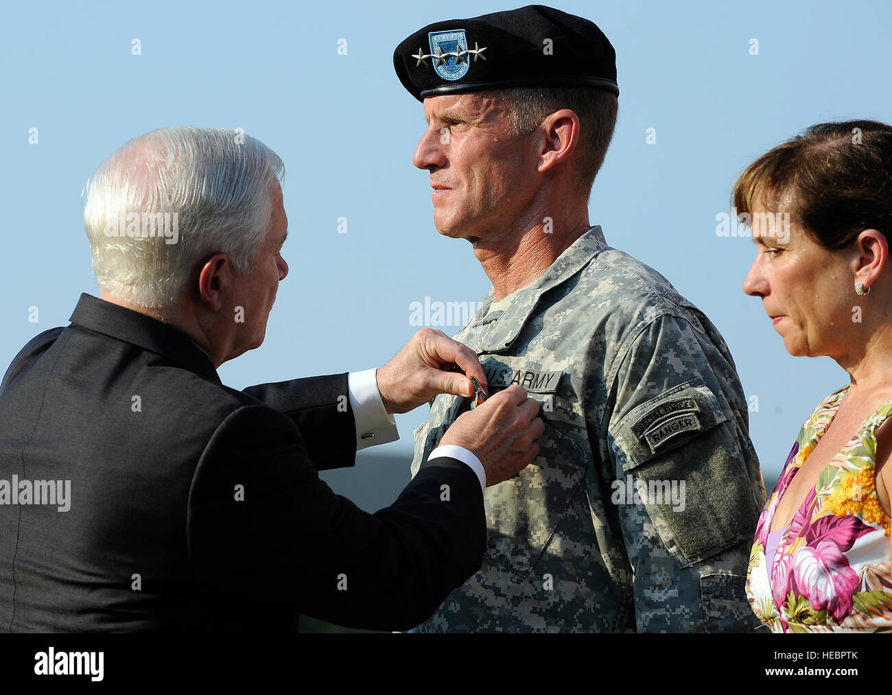 Defense Secretary Robert M. Gates, left, awards the Distinguished Service Medal to Gen. Stanley McChrystal with is wife Annie as he is honored at a retirement ceremony at Fort McNair in Washington, Friday, July 23, 2010. DoD Photo by Air Force Master Sgt. Jerry Morrison(RELEASED) Stock Photo