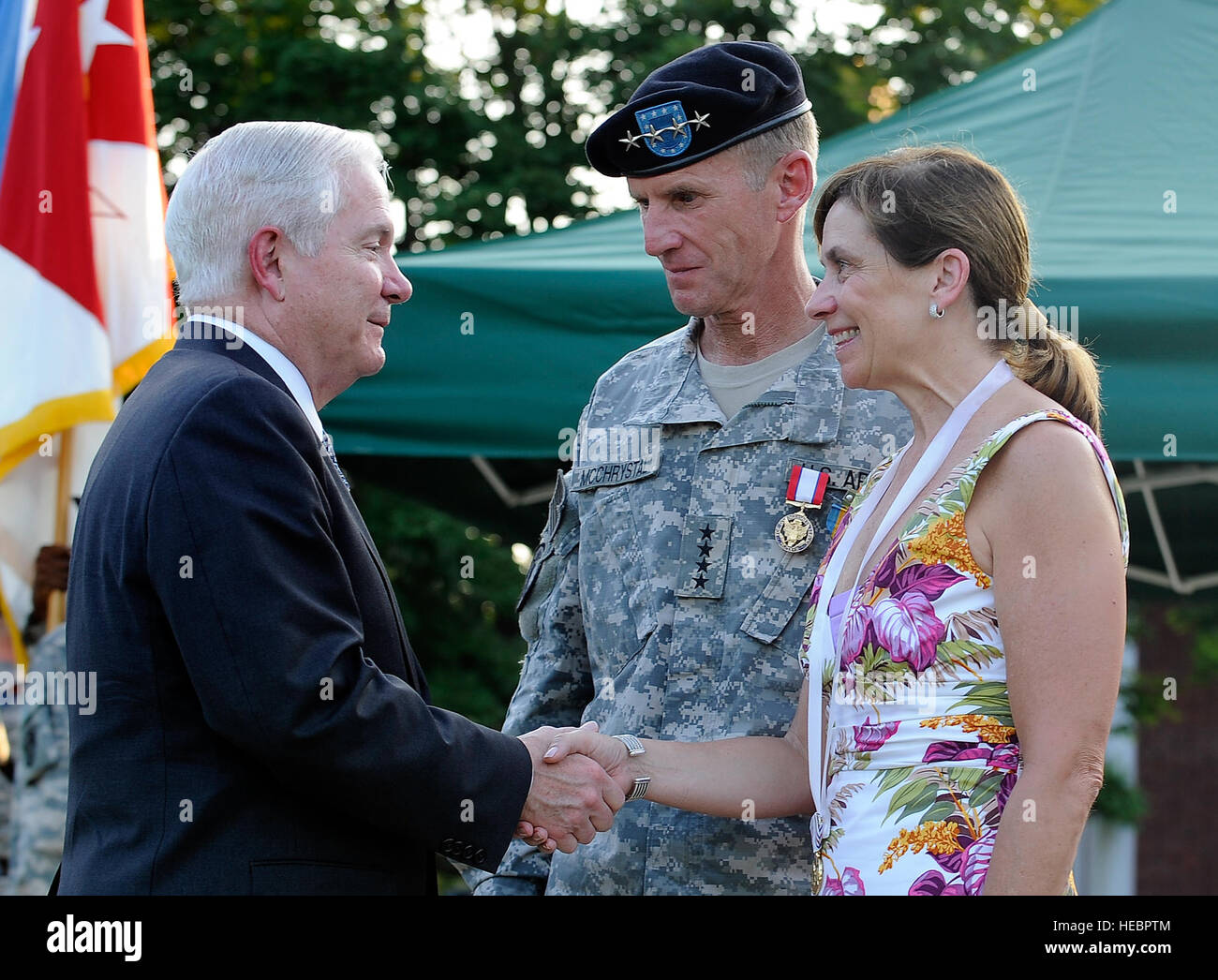 Defense Secretary Robert M. Gates congratulates Gen. Stanley McChrystal's wife Annie during his retirement ceremony on Fort McNair in Washington, Friday, July 23, 2010. DoD Photo by Air Force Master Sgt. Jerry Morrison(RELEASED) Stock Photo