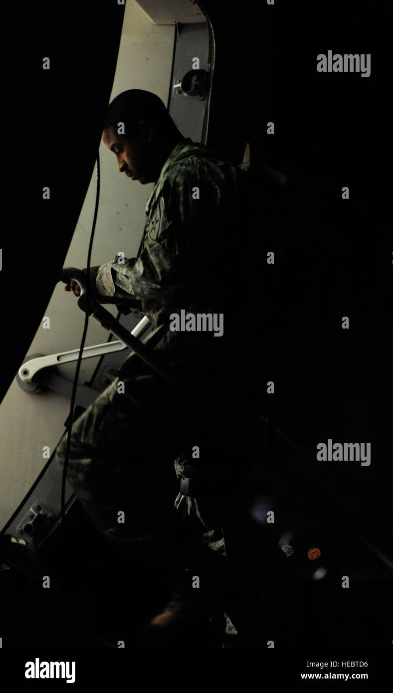 A Joint Communications Support Element (JCSE) soldier boards a C17