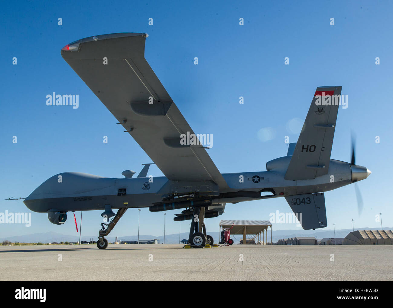 An MQ-9 Reaper remotely piloted aircraft is positioned on the flight ...