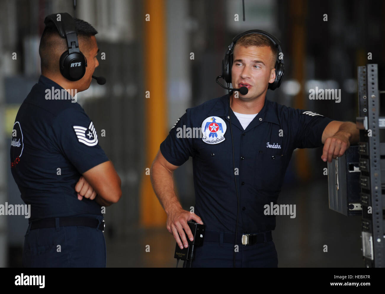 Tech. Sgt. Jeramie Hebron and Staff Sgt. Cody Fondahn ops check the Thunderbirds communications trailer prior to the performance at the Star Spangled Salute Air Show, Tinker Air Force Base, Okla., June 22, 2014. (U.S. Air Force Photo/Master Sgt. Stan Parker) Stock Photo