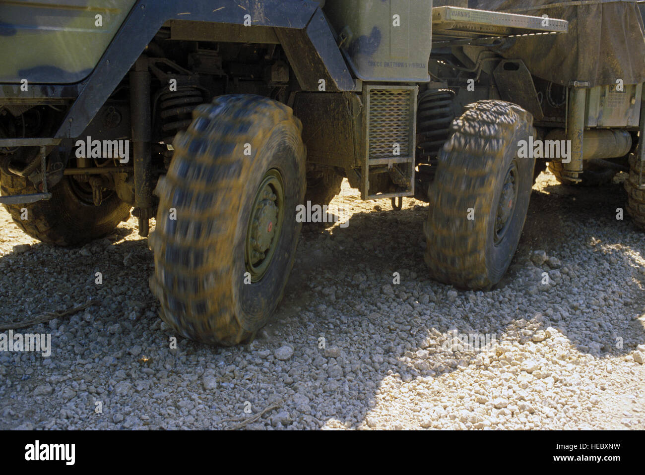 A left side close-up view of the multi-wheel steering system on the tractor portion of a ground-launched cruise missile transporter-erector-launcher (TEL).  The TEL is assigned to the 501st Tactical Missile Wing. Stock Photo