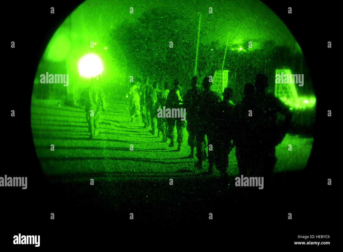 Djiboutian army soldiers walk to their start point during a night vision goggle class in Arta, Djibouti, on March 25, 2012. The U.S. Army's 3rd Squadron, 124th Cavalry Regiment, deployed in support of Combined Joint Task Force - Horn of Africa (CJTF-HOA), is helping train Djiboutian army soldiers for an upcoming deployment to Somalia. Stock Photo