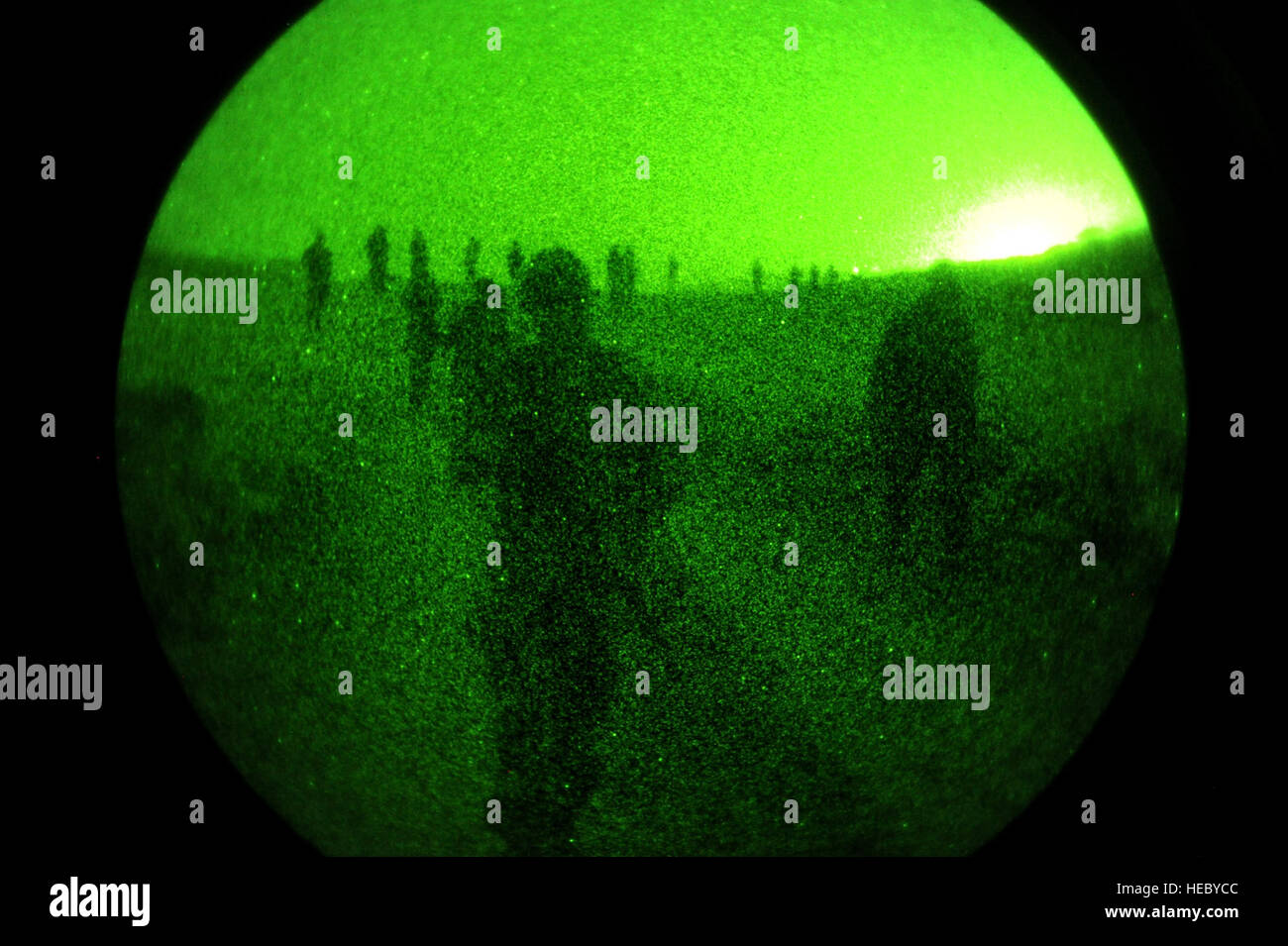 Djiboutian army soldiers walk along their route during a night vision goggle class in Arta, Djibouti, on March 25, 2012. The U.S. Army's 3rd Squadron, 124th Cavalry Regiment, deployed in support of Combined Joint Task Force - Horn of Africa (CJTF-HOA), is helping train Djiboutian army soldiers for an upcoming deployment to Somalia. Stock Photo