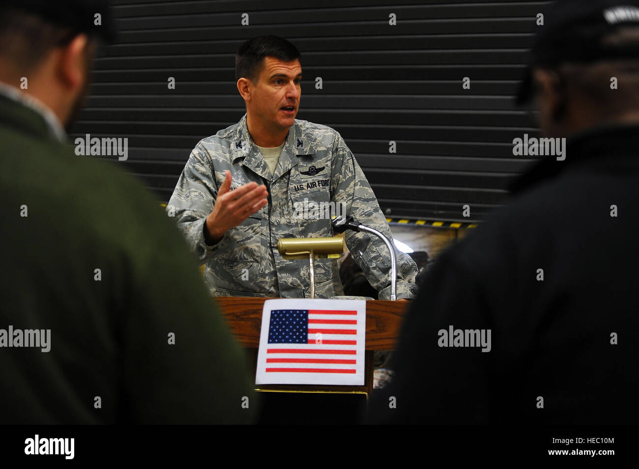 U.S. Air Force Col. Rhude Cherry III, the commander of the Joint Planning Support Element, answers questions during a mock news conference during a Joint Enabling Capabilities Command (JECC) Mission Readiness Exercise (MRX) at Shaw Air Force Base, S.C., March 13, 2014. The JECC conducted the MRX to practice for real world events, which helps them fulfill their mission of providing mission-tailored, joint capability packages to Combatant Commanders in order to facilitate rapid establishments of Joint Forces Headquarters, as well as Global Response Force execution and bridge joint operational re Stock Photo
