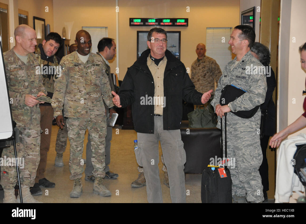 Mr. Ashton Carter, U.S. deputy secretary of defense, greets 455th Air Expeditionary Wing staff agency members during a Thanksgiving day visit at Bagram Air Field, Afghanistan, Nov. 28, 2013. Stock Photo