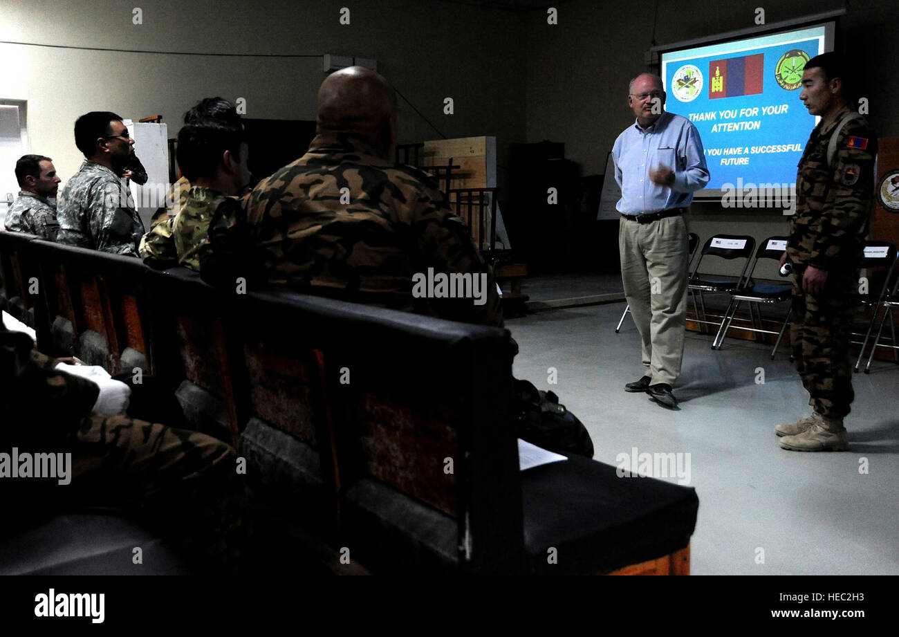 United States Ambassador to Mongolia Jonathan Addleton addresses a group of Mongolian counterinsurgency trainers during his visit to Camp Julien, Afghanistan March 22, 2011. Ambassador Addleton visited Afghanistan to extend his thanks and gratitude to members of the Mongolian Army for their contributions to the NATO Training Mission – Afghanistan goal which is to support the Government of the Islamic Republic of Afghanistan as it generates and sustains the Afghan National Security Force, develops leaders, and establishes enduring institutional capacity to enable accountable Afghan-led security Stock Photo