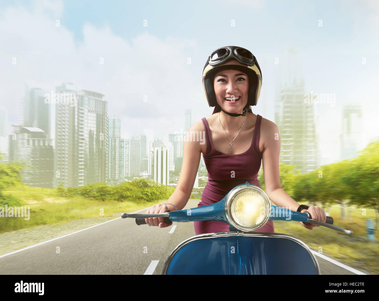 Beautiful Asian Women Riding A Blue Scooter With Helmet Around A City