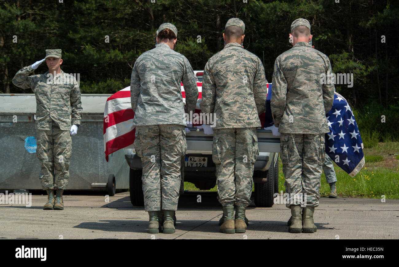 Tech. Sgt. Daniel Whiteman, 786th Force Support Squadron NCO in charge of base honor guard, salutes during a funeral ceremony demonstration as a part of the Air Education and Training Command’s Class 5 Basic Protocol, Honors and Ceremonies Course graduation June 9, 2016, at Ramstein Air Base, Germany. Members of the Air Force Honor Guard Mobile Training Team taught the course for Honor Guard Airmen across U.S. Air Forces in Europe. The graduating class consisted of Airmen from Aviano Air Base, Italy; Royal Air Force Station Mildenhall, United Kingdom; Incirlick Air Base, Turkey and Ramstein. ( Stock Photo