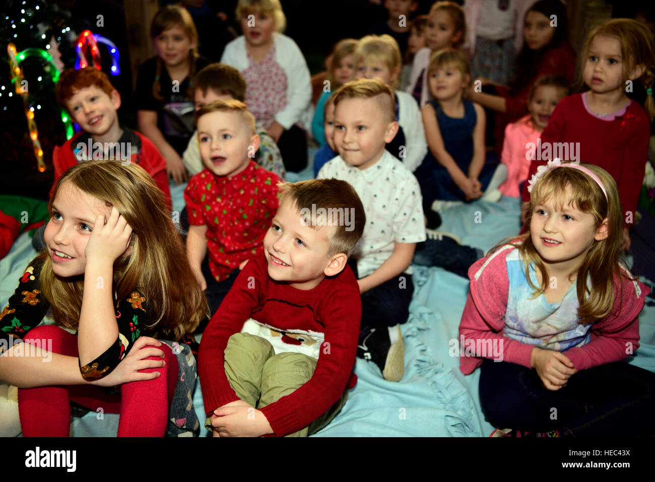 Kids at a christmas party enjoying the children's entertainer