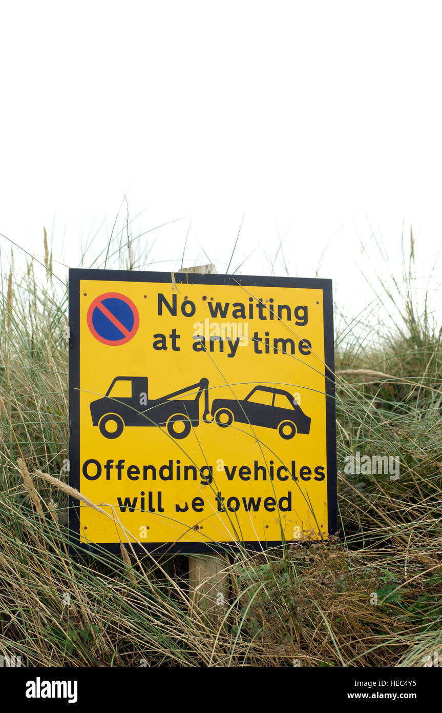 No waiting sign next to sand dunes Stock Photo