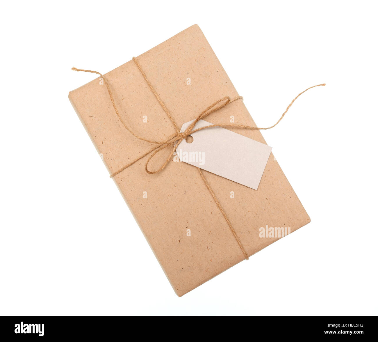 kraft paper gift box with a label on white background Stock Photo Alamy